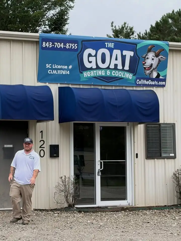 A Goat team member outside the branded Summerville shop