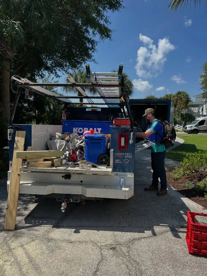 A Goat technician preparing tools at the service truck